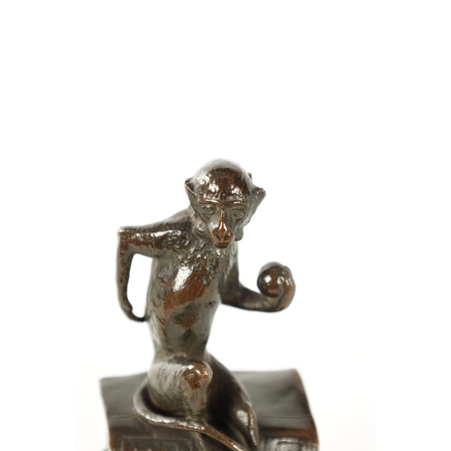 474 - JULES MOIGNIEZ. A FRENCH LATE 19TH CENTURY PATINATED BRONZE SCULPTURE modelled as a monkey sitting o... 