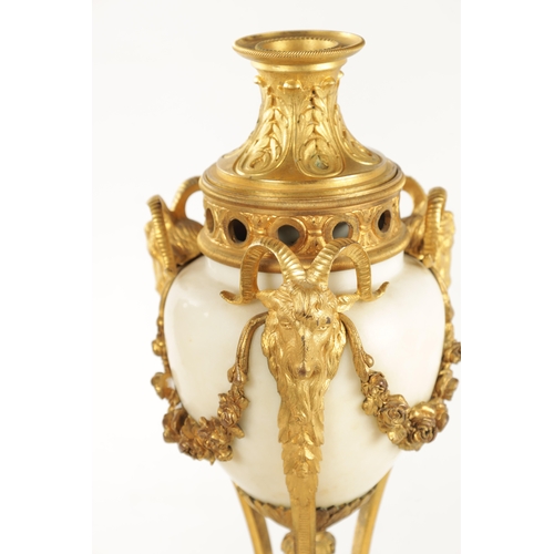 476 - A LARGE PAIR OF 19TH CENTURY FRENCH WHITE MARBLE AND ORMOLU CASSOLETTES each with reversible candle ... 