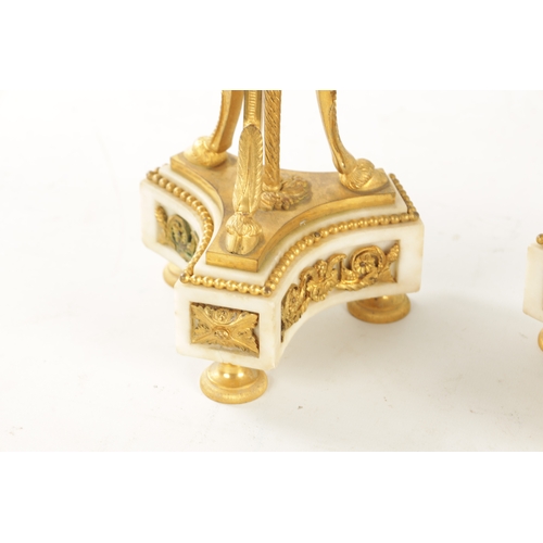 476 - A LARGE PAIR OF 19TH CENTURY FRENCH WHITE MARBLE AND ORMOLU CASSOLETTES each with reversible candle ... 