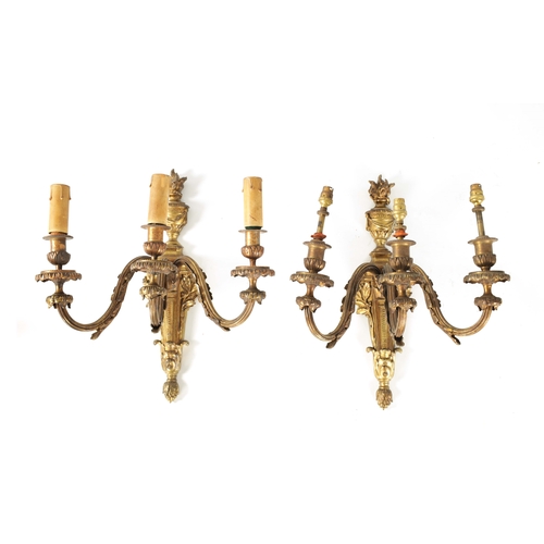 490 - A PAIR OF 19TH CENTURY STYLE CAST BRASS HANGING THREE BRANCH WALL LIGHTS the Adams style leafcast bo... 