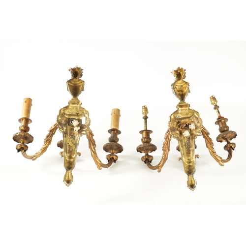 490 - A PAIR OF 19TH CENTURY STYLE CAST BRASS HANGING THREE BRANCH WALL LIGHTS the Adams style leafcast bo... 