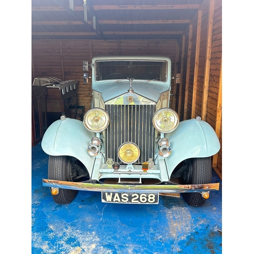 518 - A 1933 ROLLS-ROYCE 20/25 LIMOUSINE Registration no. WAS 268. Finished in a two-tone cream and baby b... 