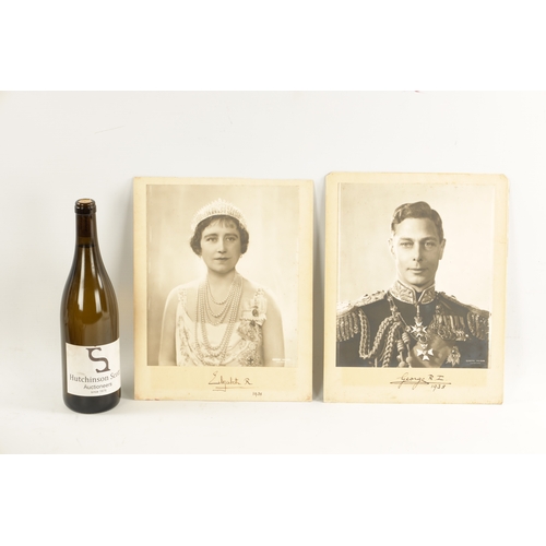 547 - A PAIR OF SIGNED PHOTOGRAPHS OF KING GEORGE VI AND HIS WIFE ELIZABETH (1895-1952) A large vintage si... 