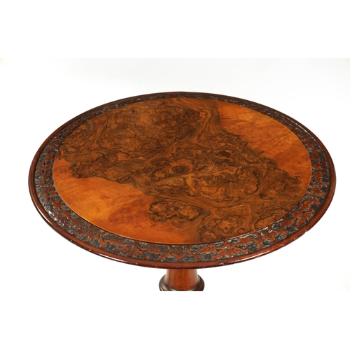 1017 - A MATCHED PAIR OF VICTORIAN BURR WALNUT OCCASIONAL TABLES with circular tops having elaborately carv... 