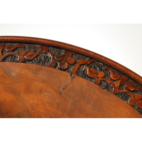 1017 - A MATCHED PAIR OF VICTORIAN BURR WALNUT OCCASIONAL TABLES with circular tops having elaborately carv... 