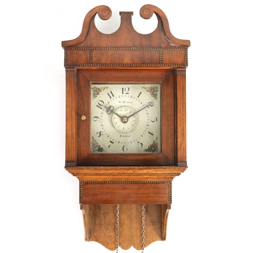 653 - W. EVANS, SALOP. A LATE GEORGE III MAHOGANY HOODED WALL CLOCK the swan neck pediment with chequered ... 