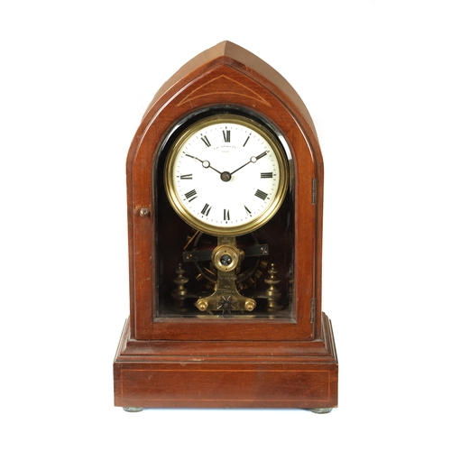 656 - EUREKA CLOCK CO. LTD. LONDON. AN EARLY 20TH CENTURY MAHOGANY ELECTRIC MANTEL CLOCK the lancet shaped... 