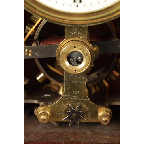 656 - EUREKA CLOCK CO. LTD. LONDON. AN EARLY 20TH CENTURY MAHOGANY ELECTRIC MANTEL CLOCK the lancet shaped... 