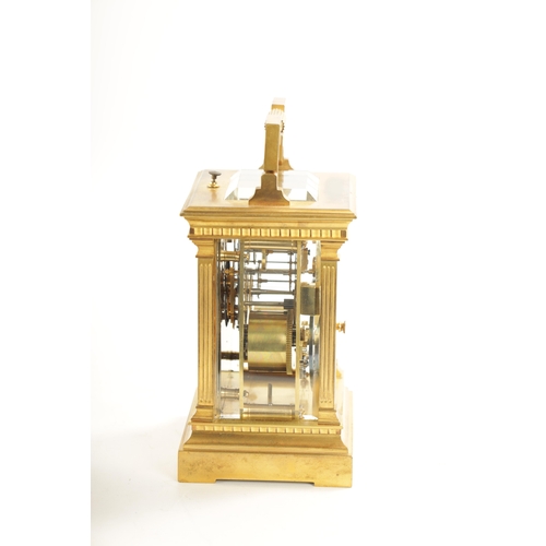 658 - A LATE 19TH CENTURY FRENCH BRASS CASED REPEATING CARRIAGE CLOCK with filigree masked dial, having an... 