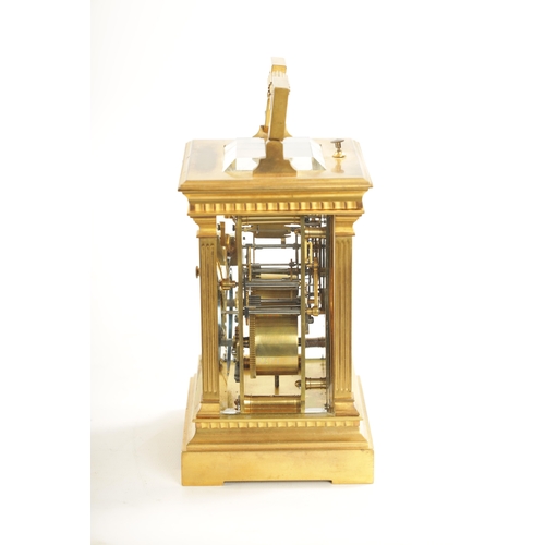 658 - A LATE 19TH CENTURY FRENCH BRASS CASED REPEATING CARRIAGE CLOCK with filigree masked dial, having an... 