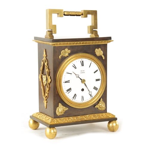 661 - DECAIX, LONDON. AN EARLY 19TH CENTURY BRONZE & ORMOLU TABLE CLOCK the case with brass hinged handle ... 