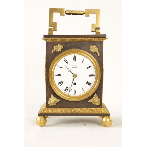 661 - DECAIX, LONDON. AN EARLY 19TH CENTURY BRONZE & ORMOLU TABLE CLOCK the case with brass hinged handle ... 