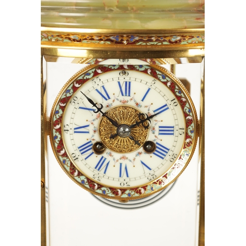 663 - A LATE 19TH CENTURY FRENCH ORMOLU, CHAMPLEVE ENAMEL AND ONYX MANTEL CLOCK surmounted by an urn finia... 