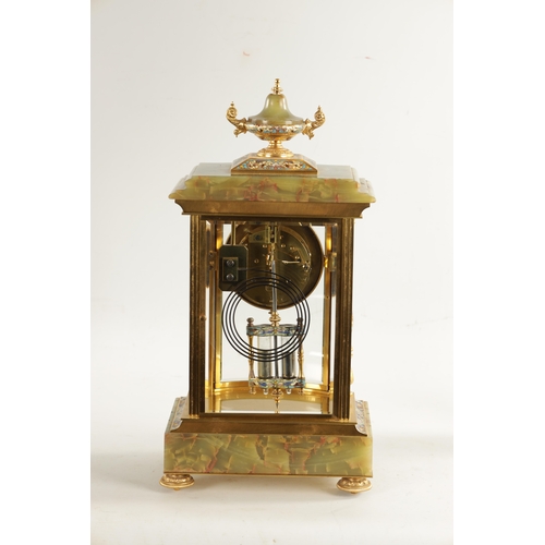 663 - A LATE 19TH CENTURY FRENCH ORMOLU, CHAMPLEVE ENAMEL AND ONYX MANTEL CLOCK surmounted by an urn finia... 