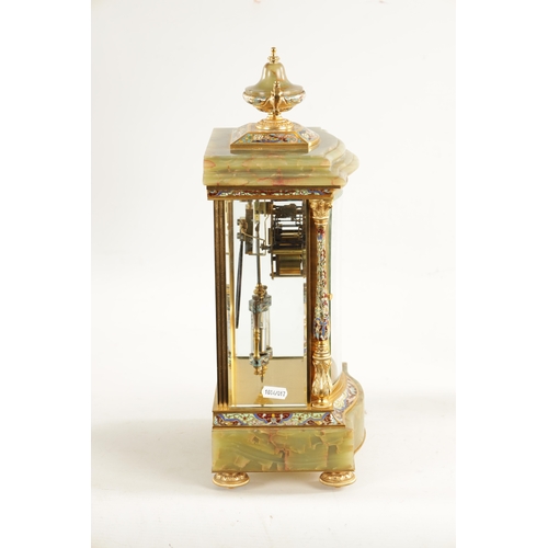 663 - A LATE 19TH CENTURY FRENCH ORMOLU, CHAMPLEVE ENAMEL AND ONYX MANTEL CLOCK surmounted by an urn finia... 