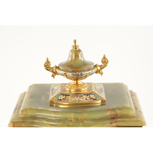 663 - A LATE 19TH CENTURY FRENCH ORMOLU, CHAMPLEVE ENAMEL AND ONYX MANTEL CLOCK surmounted by an urn finia... 