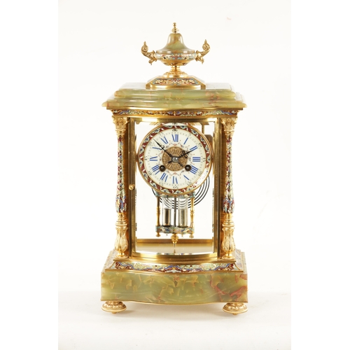 663 - A LATE 19TH CENTURY FRENCH ORMOLU, CHAMPLEVE ENAMEL AND ONYX MANTEL CLOCK surmounted by an urn finia... 