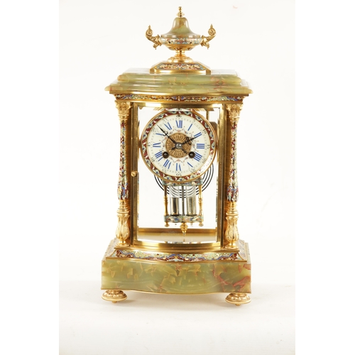 663 - A LATE 19TH CENTURY FRENCH ORMOLU, CHAMPLEVE ENAMEL AND ONYX MANTEL CLOCK surmounted by an urn finia... 