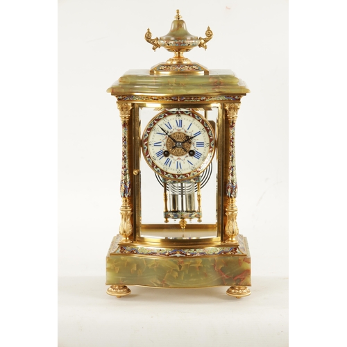 663 - A LATE 19TH CENTURY FRENCH ORMOLU, CHAMPLEVE ENAMEL AND ONYX MANTEL CLOCK surmounted by an urn finia... 