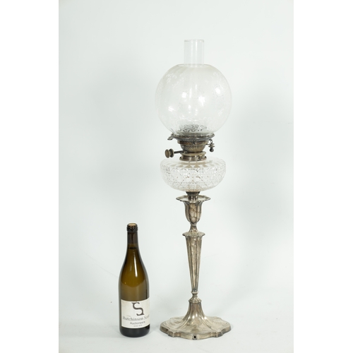 283 - AN EDWARDIAN SILVER OIL LAMP With fluted tapering stem and shaped base - Hawksworth, Eyre & Co Ltd. ... 