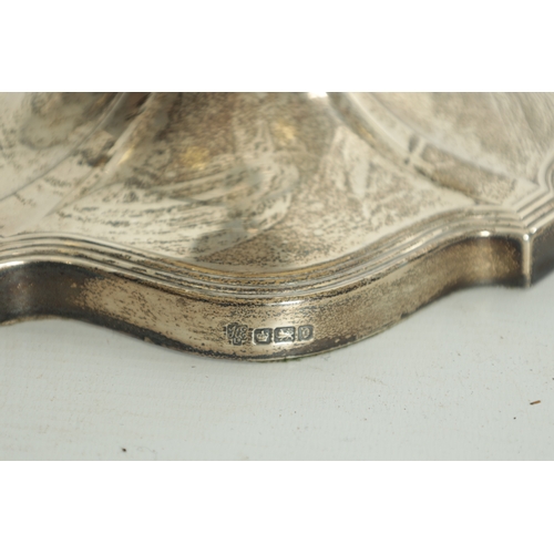 283 - AN EDWARDIAN SILVER OIL LAMP With fluted tapering stem and shaped base - Hawksworth, Eyre & Co Ltd. ... 