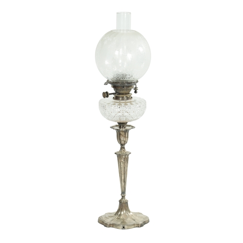 283 - AN EDWARDIAN SILVER OIL LAMP With fluted tapering stem and shaped base - Hawksworth, Eyre & Co Ltd. ... 