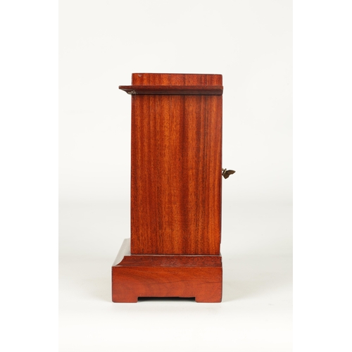 27 - A SMALL LATE 19TH CENTURY MAHOGANY MANTEL CLOCK Of rectangular form with glazed front enclosing a gi... 