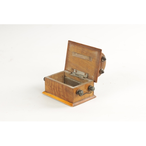 277 - A 19TH CENTURY MATCH HOLDER FORMED ASD A STUDDED CASKET having side handles and studd decoration (8c... 