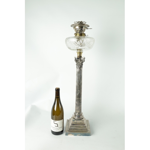 36 - A 19TH CENTURY SILVER PLATED CORINTHIUM COLUMN OIL LAMP with cut glass font. (70cm high)