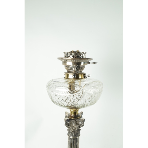 36 - A 19TH CENTURY SILVER PLATED CORINTHIUM COLUMN OIL LAMP with cut glass font. (70cm high)