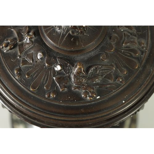 90 - A 19TH CENTURY BRONZE LIDDED TAZZA with figural finial and stylised floral decoration, raised on a g... 