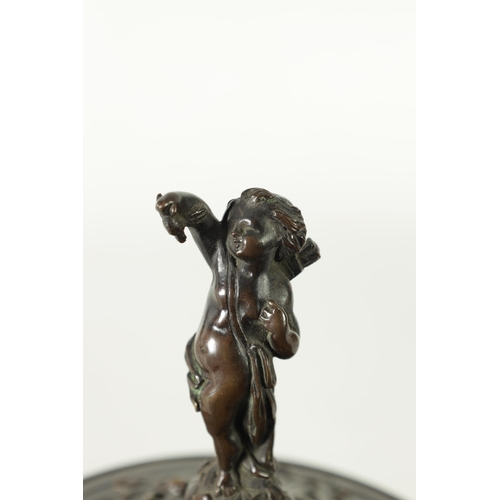 90 - A 19TH CENTURY BRONZE LIDDED TAZZA with figural finial and stylised floral decoration, raised on a g... 