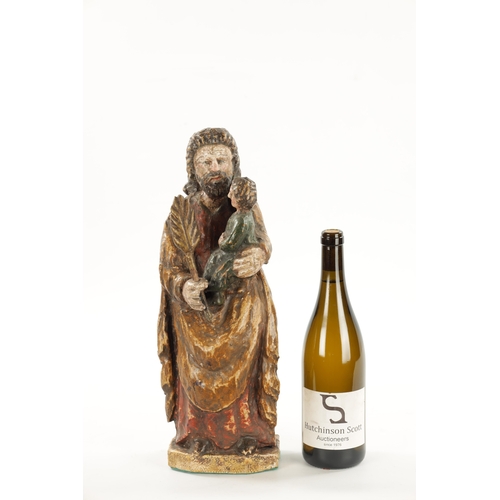 100 - AN EARLY 18TH CENTURY SPANISH CARVED FIGURE OF MOSES WITH CHILD having polychrome decoration. (42cm ... 