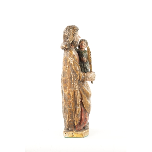 100 - AN EARLY 18TH CENTURY SPANISH CARVED FIGURE OF MOSES WITH CHILD having polychrome decoration. (42cm ... 