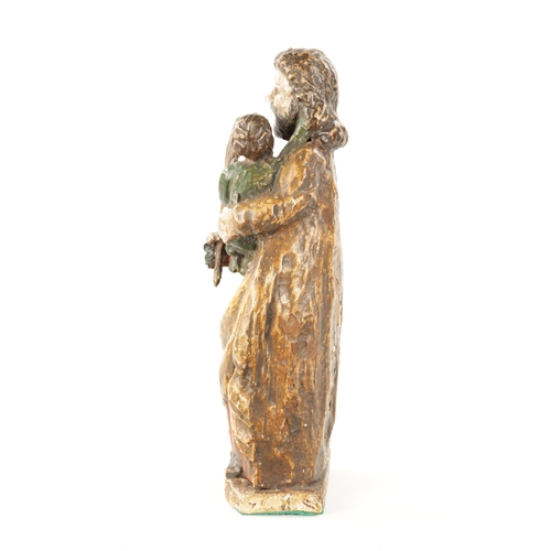 100 - AN EARLY 18TH CENTURY SPANISH CARVED FIGURE OF MOSES WITH CHILD having polychrome decoration. (42cm ... 