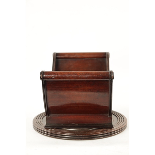 113 - A RARE 18TH CENTURY MAHOGANY REVOLVING CHEESE COASTER of sleigh form with ring turned base. (40cm wi... 