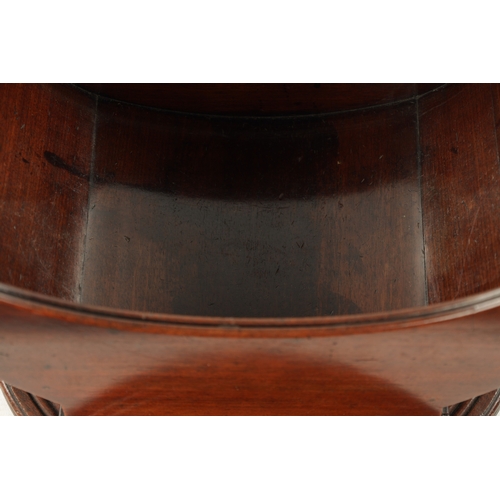 113 - A RARE 18TH CENTURY MAHOGANY REVOLVING CHEESE COASTER of sleigh form with ring turned base. (40cm wi... 