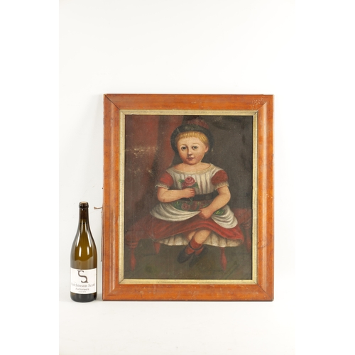 127 - A 19TH CENTURY NAIVE OIL PAINTING ON CANVAS of a young child - mounted in a maple frame. (49cm high ... 