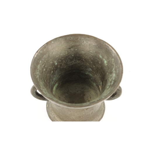 129 - A 17TH CENTURY BRONZE MORTAR bearing London makers mark (13.5cm high 19cm wide)