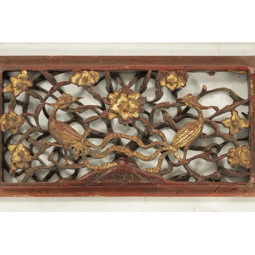 13 - A SELECTION OF FIVE CARVED CHINESE PANELS depicting birds in branchwork (137cm and 39cm wide)