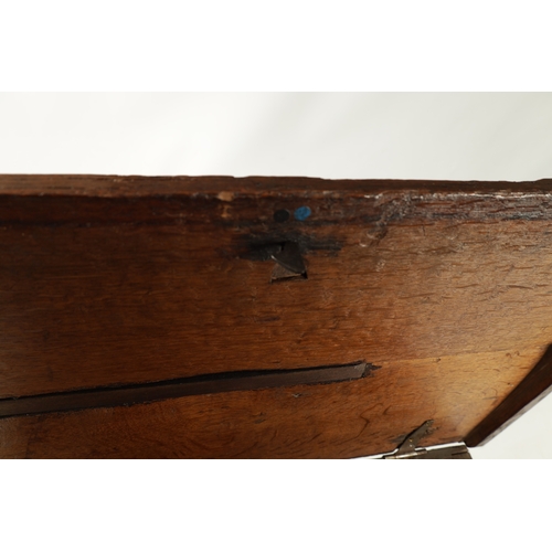 135 - A RARE 16TH CENTURY OAK TUDOR PERIOD COFFER OF SMALL SIZE with a double carved panel front depicting... 