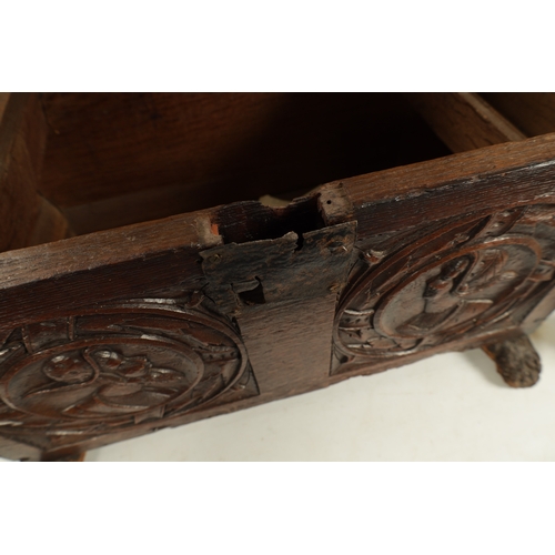 135 - A RARE 16TH CENTURY OAK TUDOR PERIOD COFFER OF SMALL SIZE with a double carved panel front depicting... 