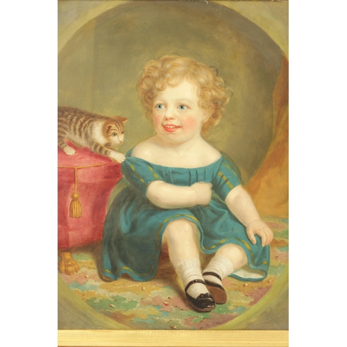 138 - A 19TH CENTURY OIL ON CANVAS depicting a young girl playing with a cat - mounted in cushioned bird's... 