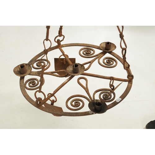 144 - AN ARTS AND CRAFTS MEDIEVAL STYLE WROUGHT IRON HANGING CHANDELIER with hanging shields (49cm diamete... 