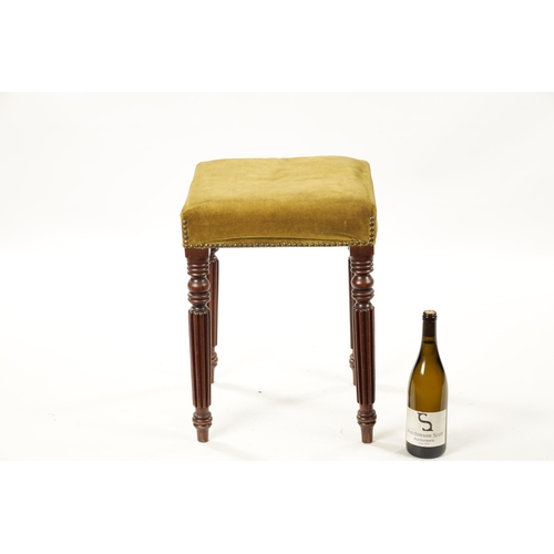 151 - A WILLIAM IV MAHOGANY UPHOLSTERED STOOL IN THE MANNER OF GILLOWS raised on reeded turned legs (37cm ... 