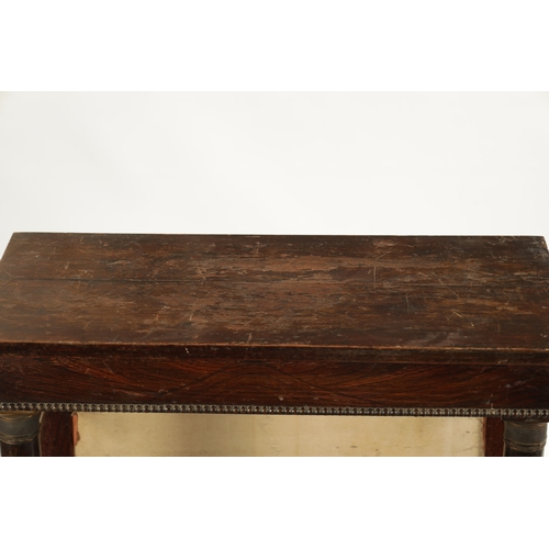 154 - A SMALL REGENCY EMPIRE SIMULATED ROSEWOOD OPEN BOOKCASE with brass capped turned columns supporting ... 