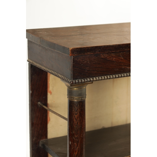 154 - A SMALL REGENCY EMPIRE SIMULATED ROSEWOOD OPEN BOOKCASE with brass capped turned columns supporting ... 