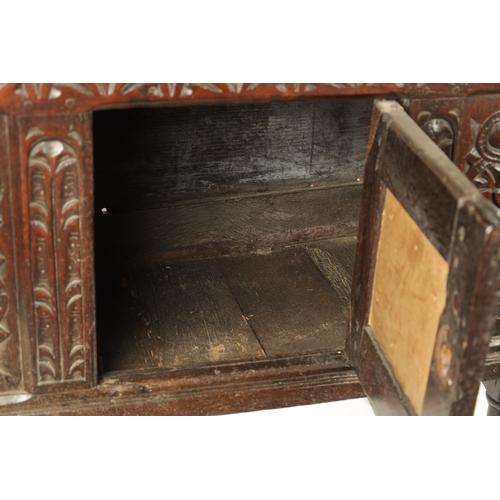 160 - A 17TH CENTURY AND LATER OAK HUTCH CUPBOARD with carved front raised on turned supports (95cm wide 4... 