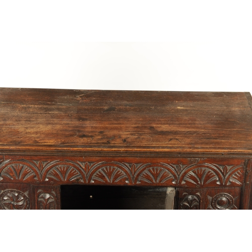 160 - A 17TH CENTURY AND LATER OAK HUTCH CUPBOARD with carved front raised on turned supports (95cm wide 4... 