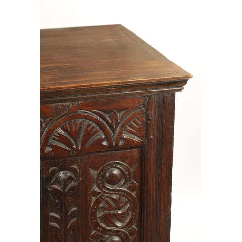 160 - A 17TH CENTURY AND LATER OAK HUTCH CUPBOARD with carved front raised on turned supports (95cm wide 4... 